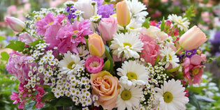  Colourful flower arrangement in a decorative vase.